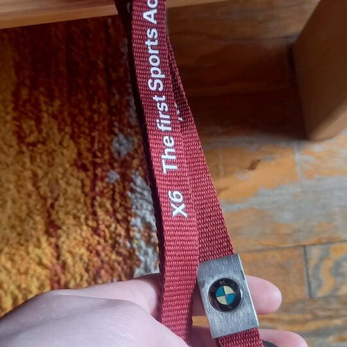 BMW keychain set like new, burgundy color