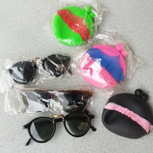Set of 3 wallets and 3 pairs of new kids' glasses, pink and green