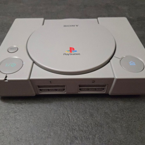 Sony PlayStation SCPH-7502 PS1 console used with Dualshock controller