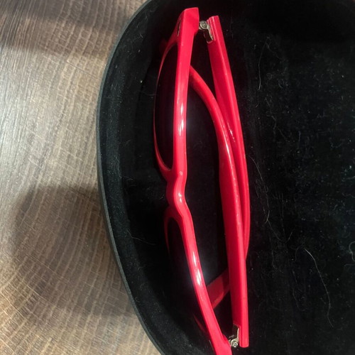 Sunglasses with red-pink frame, recently replaced lenses