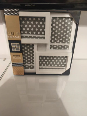 Κορνίζα καινούργια, χωράει πολλές φωτογραφίες