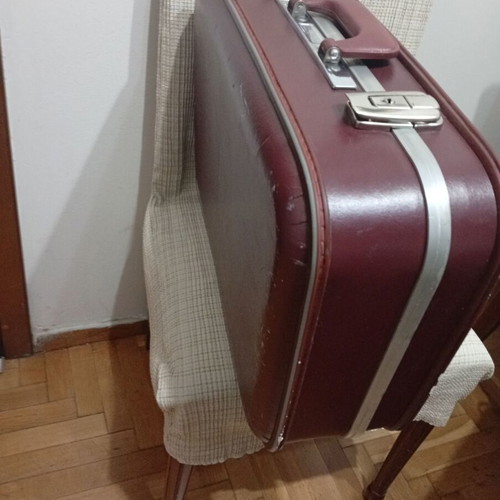 Vintage travel suitcase used, burgundy leather exterior
