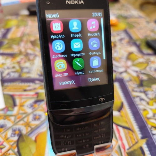 Nokia C2-02 used with charger and new battery