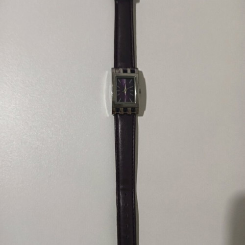 Wristwatch used in purple color with light wear