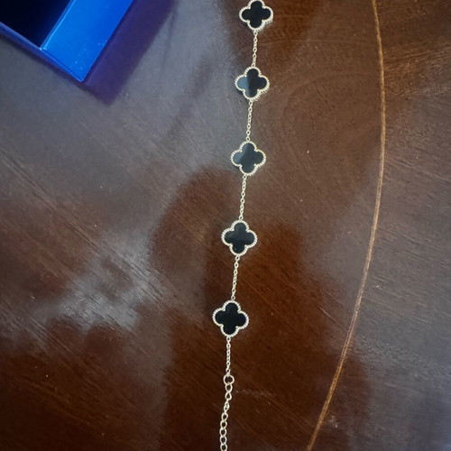 Bracelet with black clovers new, gold plated