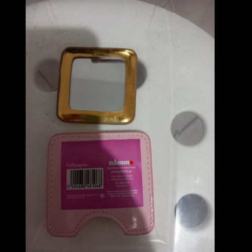 Compact mirror unused