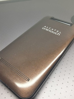 Alcatel mobile phone, brown