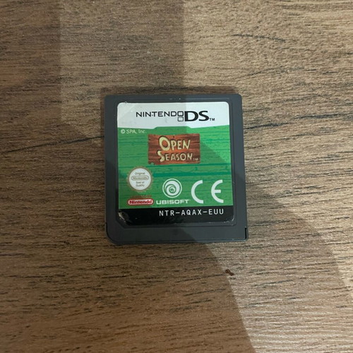 Nintendo DS Lite used, black with cartridge and original charger