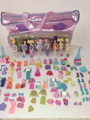 Polly Pocket bag with 9 dolls and accessories used
