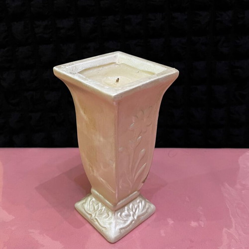 Decorative ceramic candle holder used with Virgin Mary and Christ