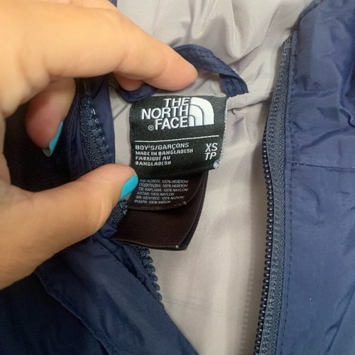 The North Face Kids Windbreaker used, size XS, blue
