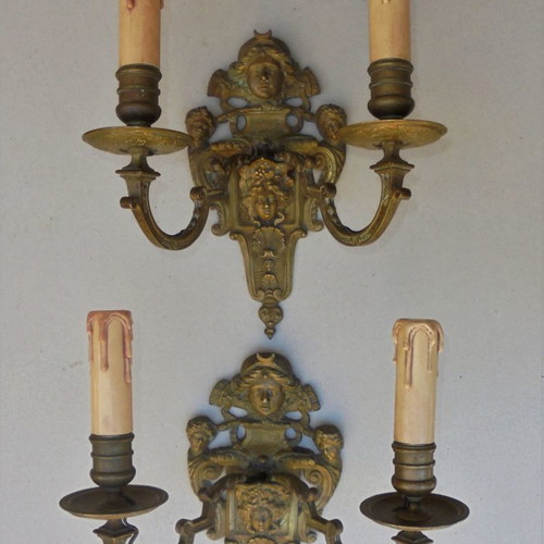 Pair of bronze antique two-light wall sconces, late 19th century