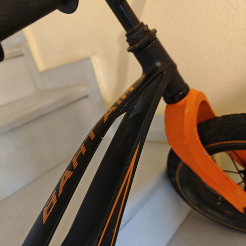 Lionelo Bart Air balance bike used, black orange