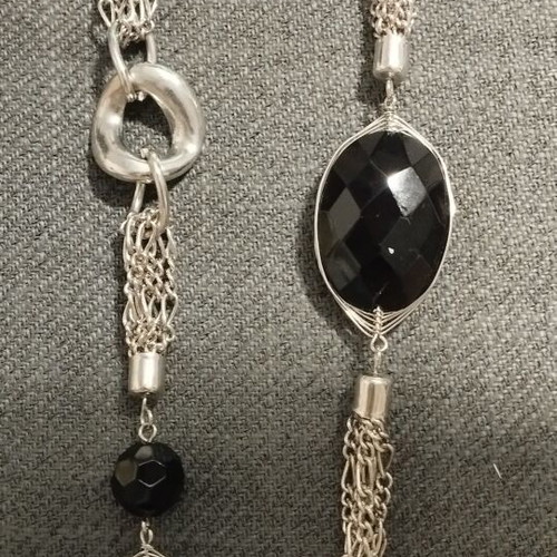Long women's necklace with large black stones and silver chains like new