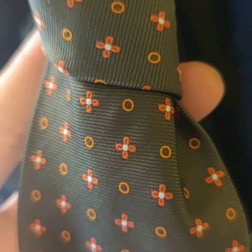 Silk ties new in dark green, orange, and copper colors