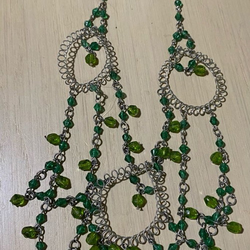 Necklace new with green beads and silver details