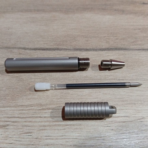 EDC Mini Titanium Pen like new with screw cap and keychain