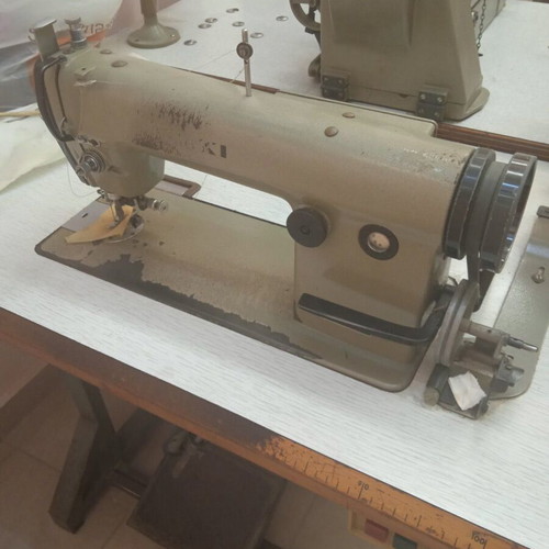 Industrial sewing machines used, including Treasure button machine and cutters