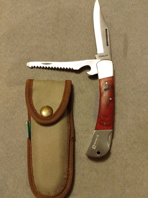 Pocket knife with blade, saw and opener like new