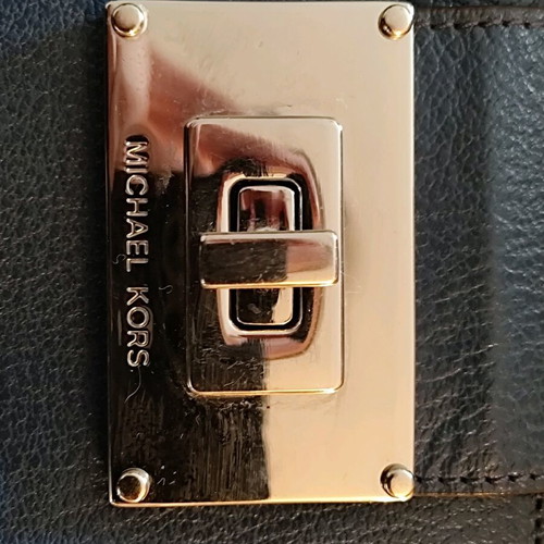 Michael Kors blue leather clutch bag like new with silver clasp