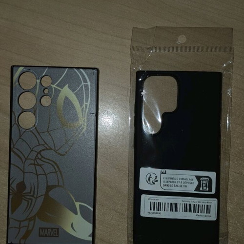 S23 Ultra cases Marvel Spiderman and Total Black like new