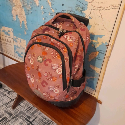 School backpack with wheels used