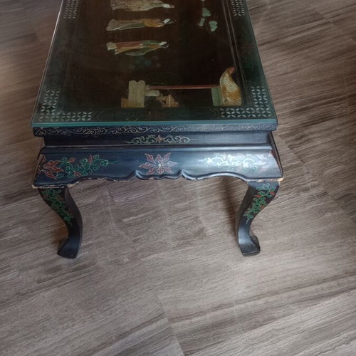 Carved table with folding legs used, traditional Chinese design