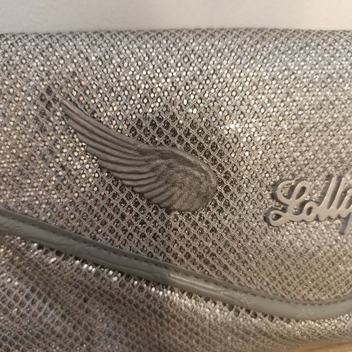 Lollipops bag silver color with decorative wings, like new