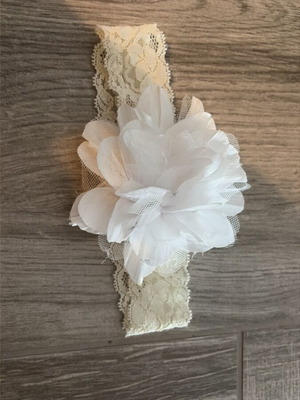 Baby hair accessory with white flower