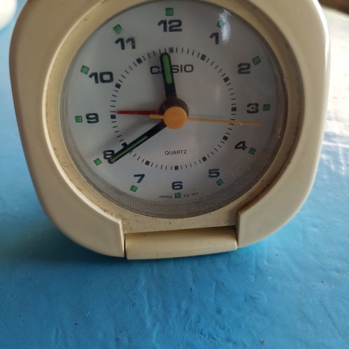 Casio portable alarm clock used, analog display