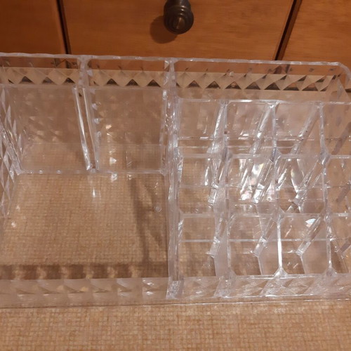 Cosmetic organizer used, transparent