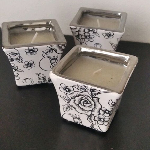 Set of 3 porcelain candlesticks new with floral and silver details