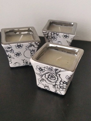 Set of 3 porcelain candlesticks new with floral and silver details