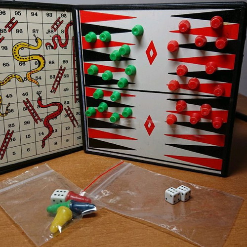 Magnetic Snakes and Ladders and Backgammon used, mini board games