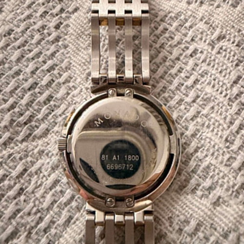Movado Esperanza ladies watch used, silver-gold tone bracelet, black dial