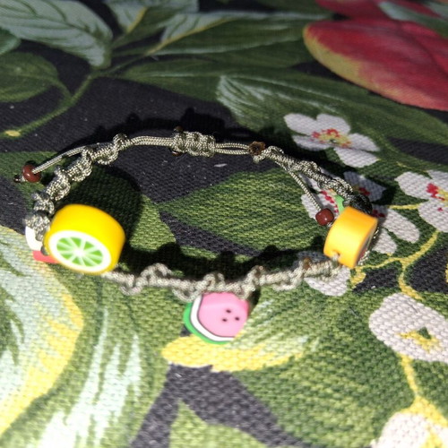 Macrame bracelet with decorative fruit beads