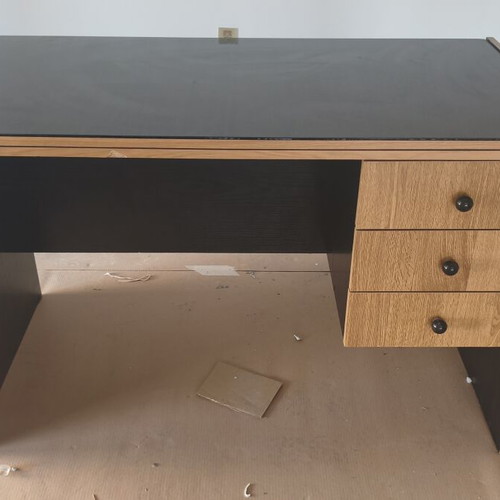 Office desk set used with three drawers and two chairs with wheels