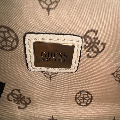 Guess white shoulder bag used with embossed logo pattern
