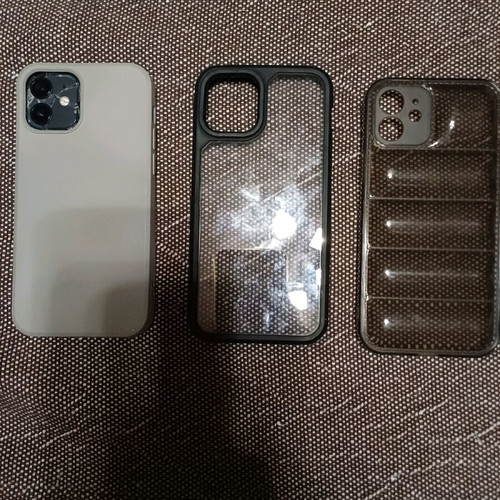 Apple iPhone 12 64GB like new with cracked back and 3 cases