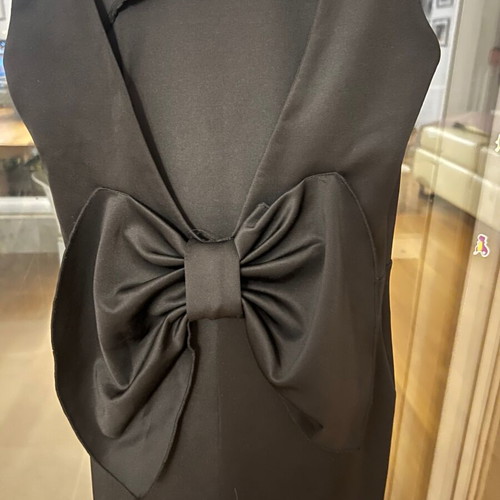 Black mini dress size S like new polyester with open back and large bow