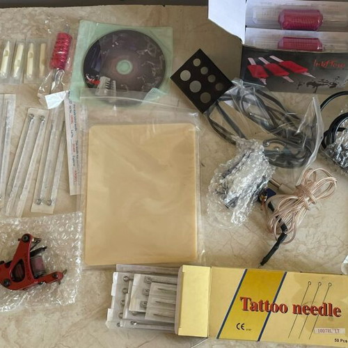 Dragonhawk Tattoo Coil Set used with extra practice materials