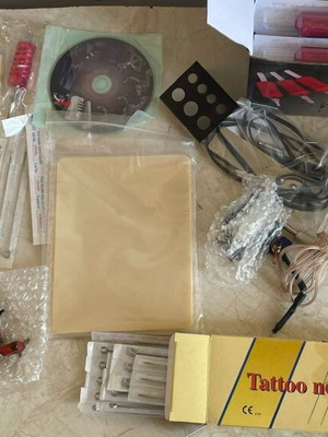 Dragonhawk Tattoo Coil Set used with extra practice materials