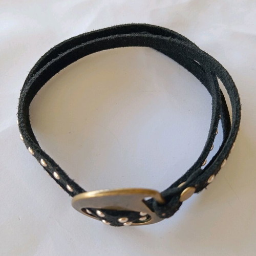 Rock bracelet with black cord and studs adjustable