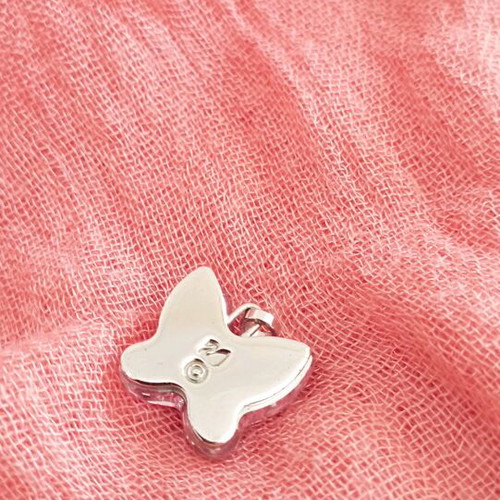 Swarovski butterfly pendant like new, lilac color