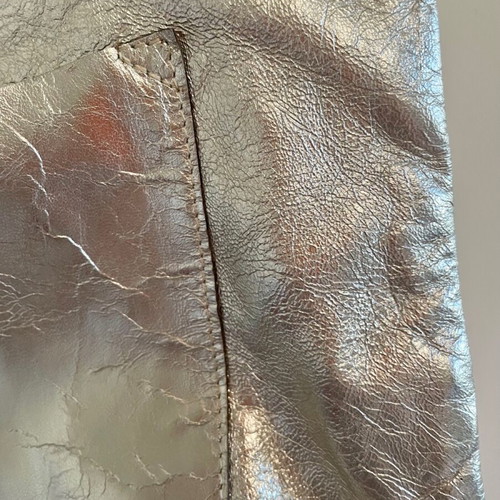 Thiros leather shoulder bag silver used with small scratches