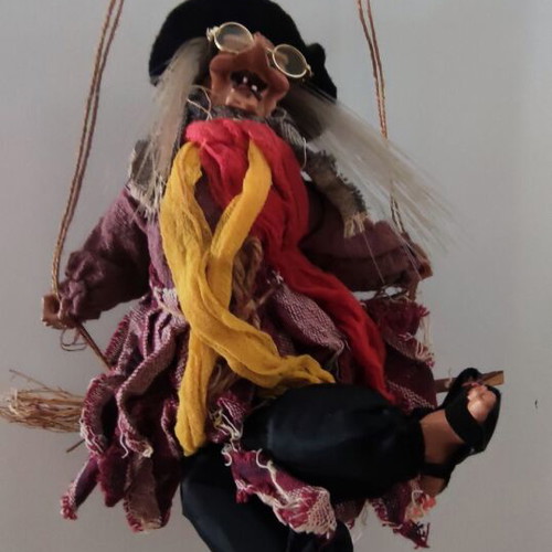 Witch figure used with sound and light-up hair
