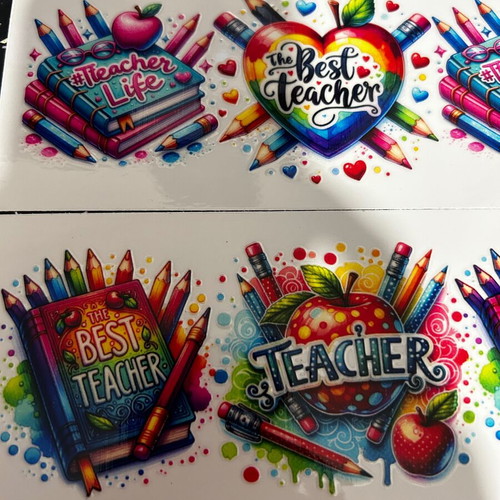 Mugs new with best teacher sticker, set of 2