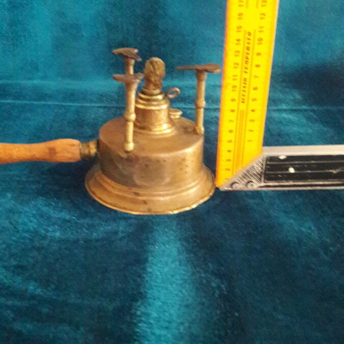Vintage brass gas burner used with slight base deformation