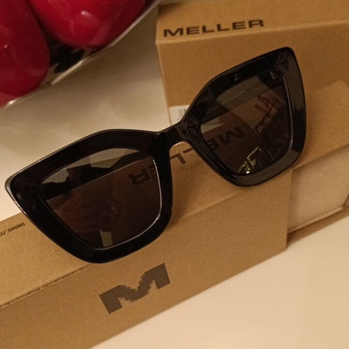 Meller Azalee sunglasses new with black polarized lenses