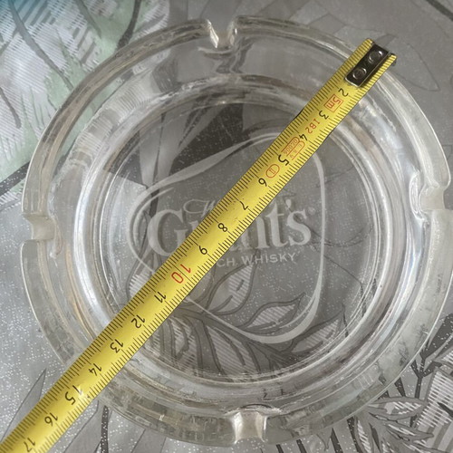Glass ashtray used with Grant's whisky logo